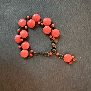 Coral bead and brass David Aubrey bracelet.